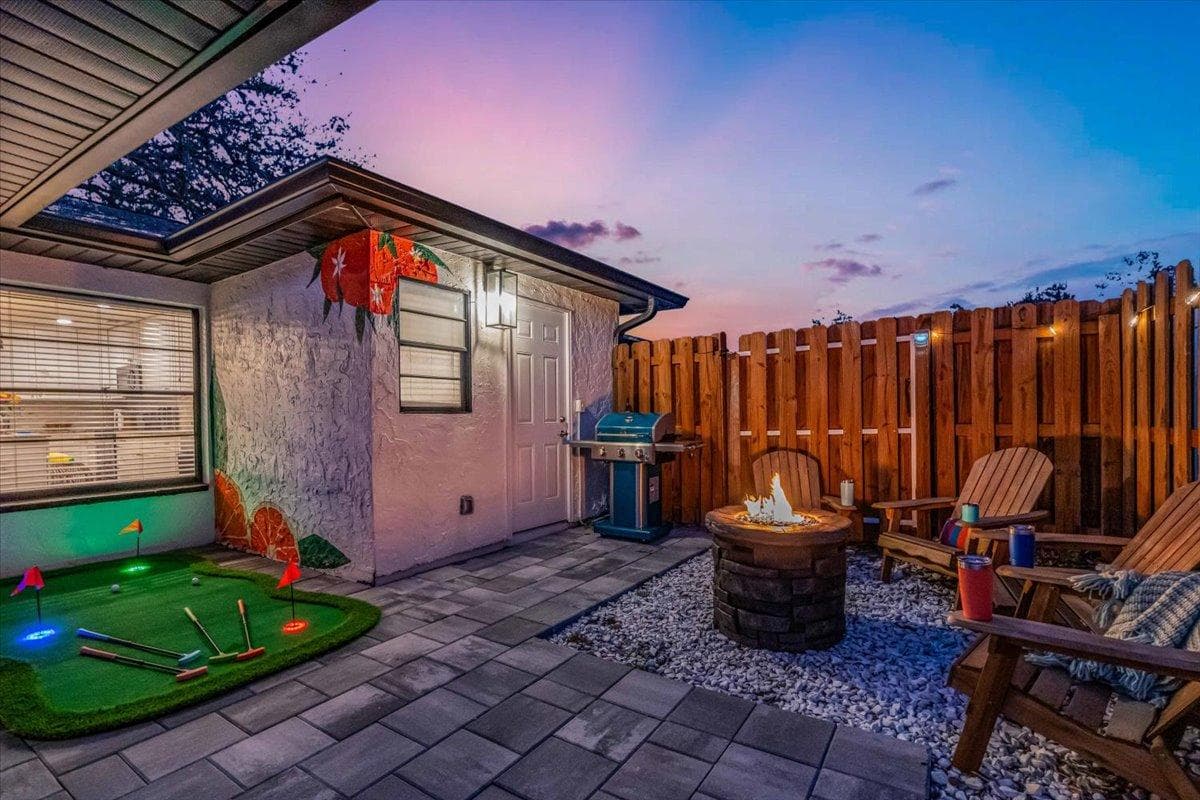 Outdoor Oasis: Play mini golf, grill up favorites, and unwind by the fire pit under twinkling lights!
