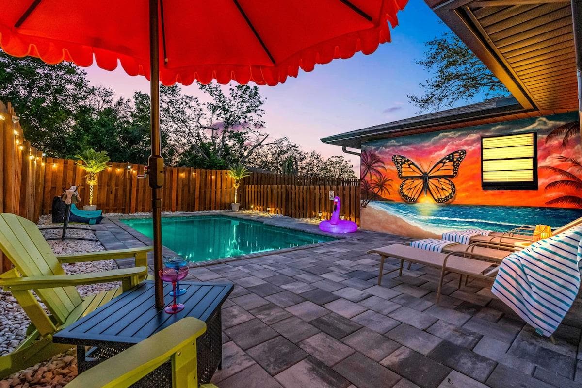 Tropical Retreat in Sarasota! Unwind in your private oasis featuring  vibrant murals, a saltwater pool, and cozy tropical vibes. Perfect for fun, relaxation and unforgettable memories—your dream getaway starts here! 